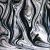 Spectrum 400 Baroque. Noir en vague sur clair.